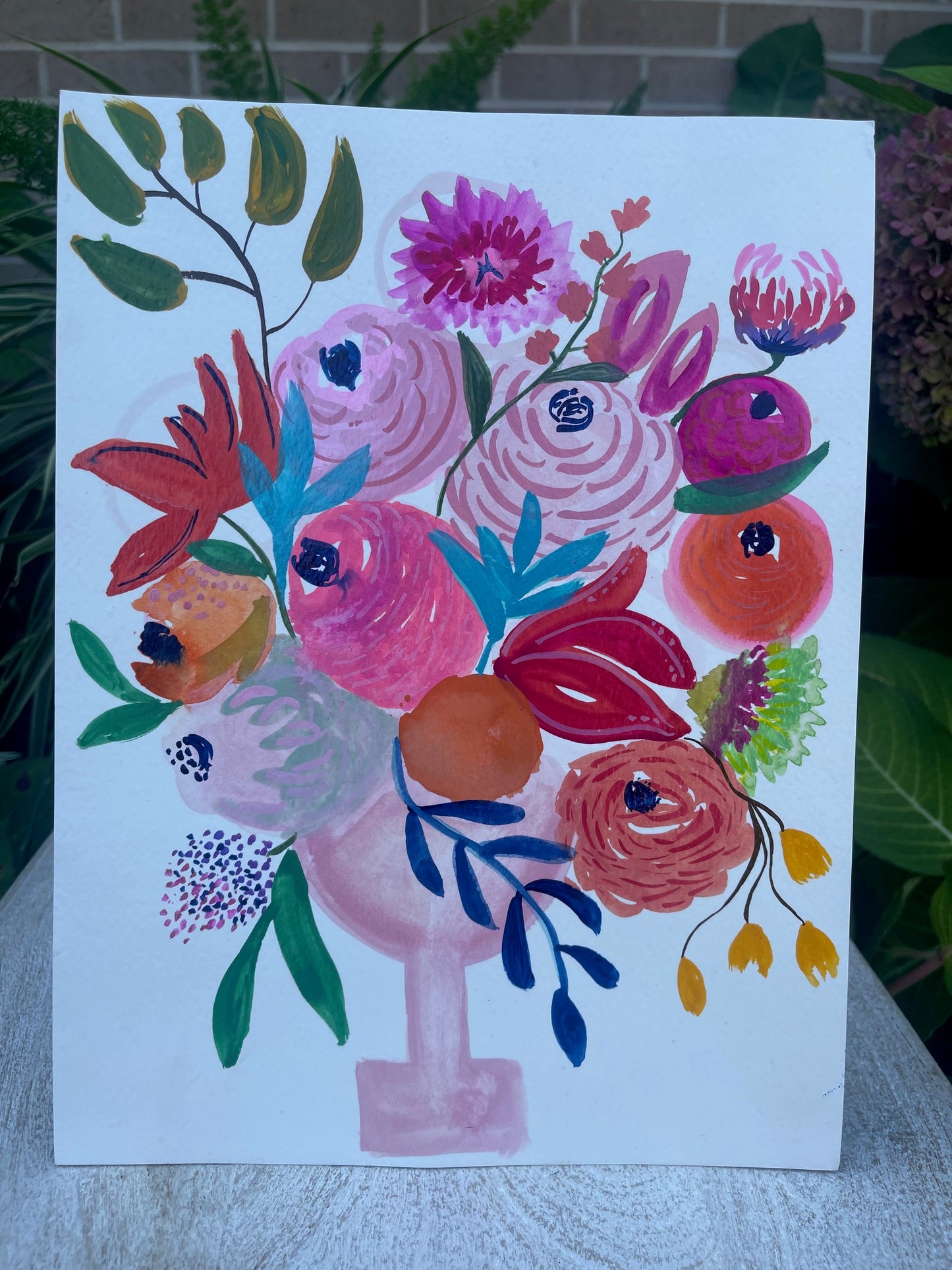 Floral bouquet in pink vase