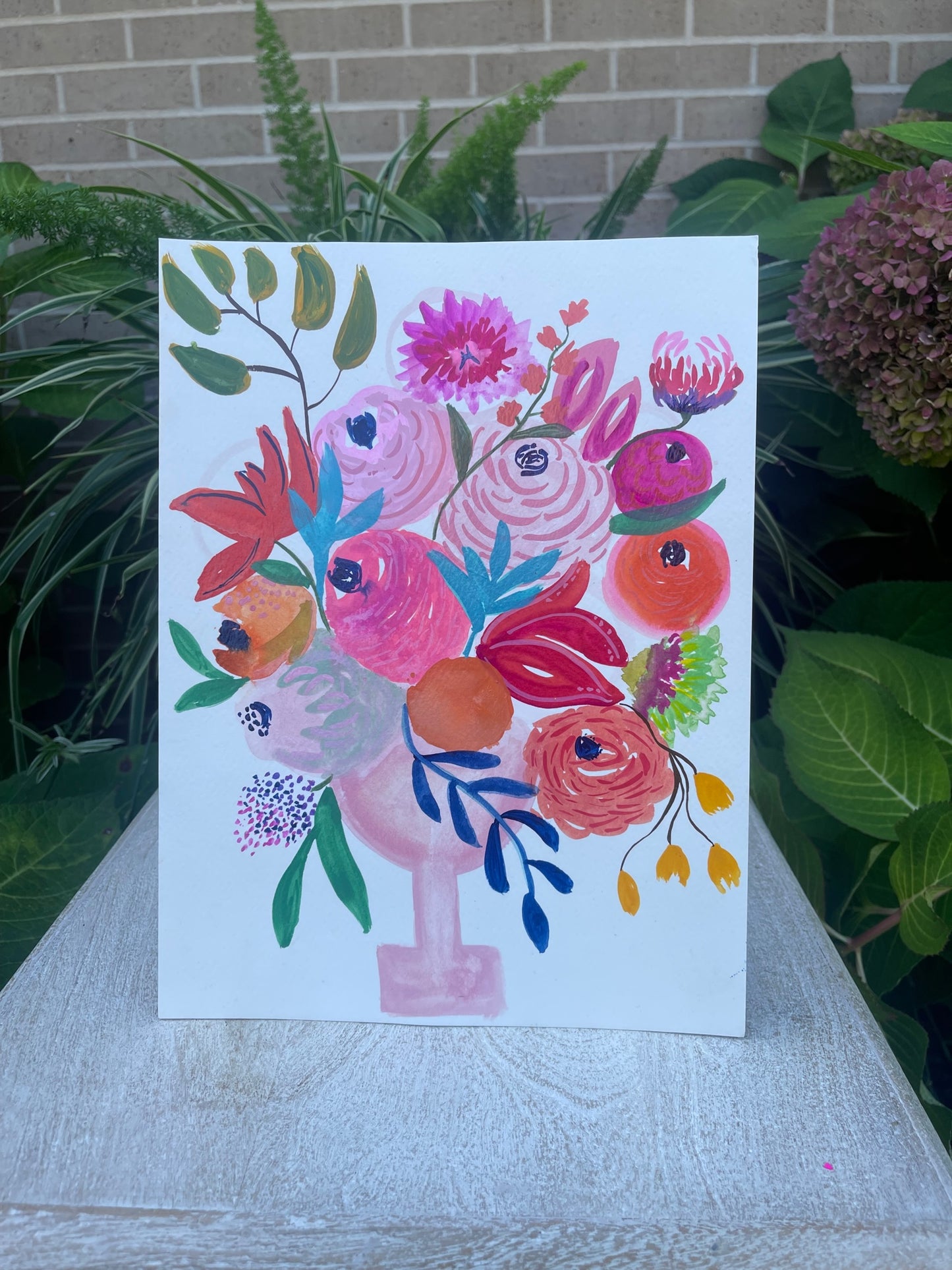 Floral bouquet in pink vase
